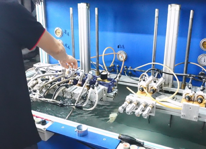 Concealed shower valves mounted on a pressure and flow test bench